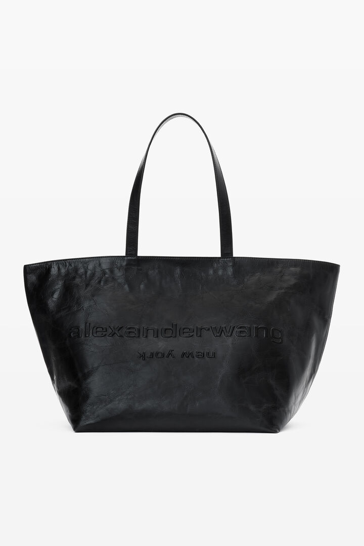 Black leather tote bag with textured logo