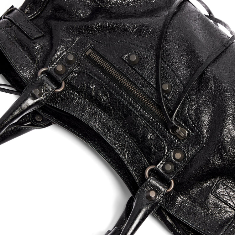 Le City Bag East West in black Arena lambskin, brass hardware