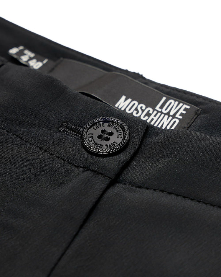 MOSCHINO Solid color Shorts