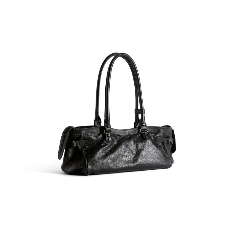 Le City Bag East West in black Arena lambskin, brass hardware