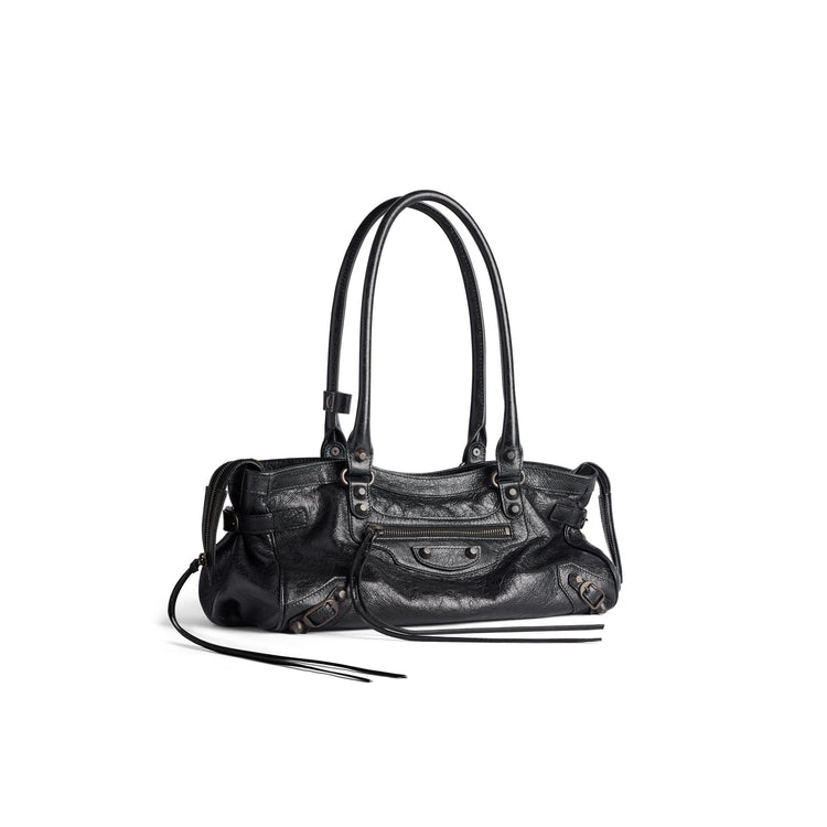 Le City Bag East West in black Arena lambskin, brass hardware