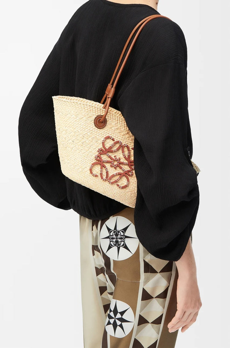 Small Anagram Basket bag in iraca palm and calfskin