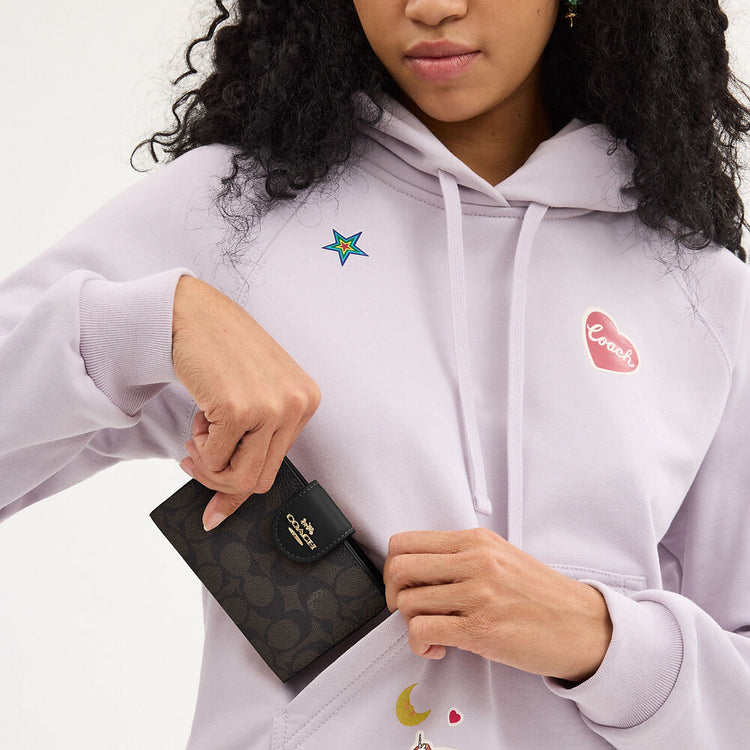 Medium Corner Zip Wallet In Signature Canvas